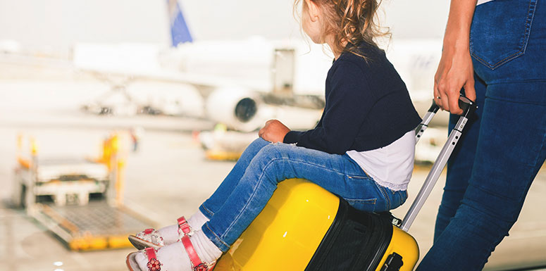 A Young Girl at an Airport